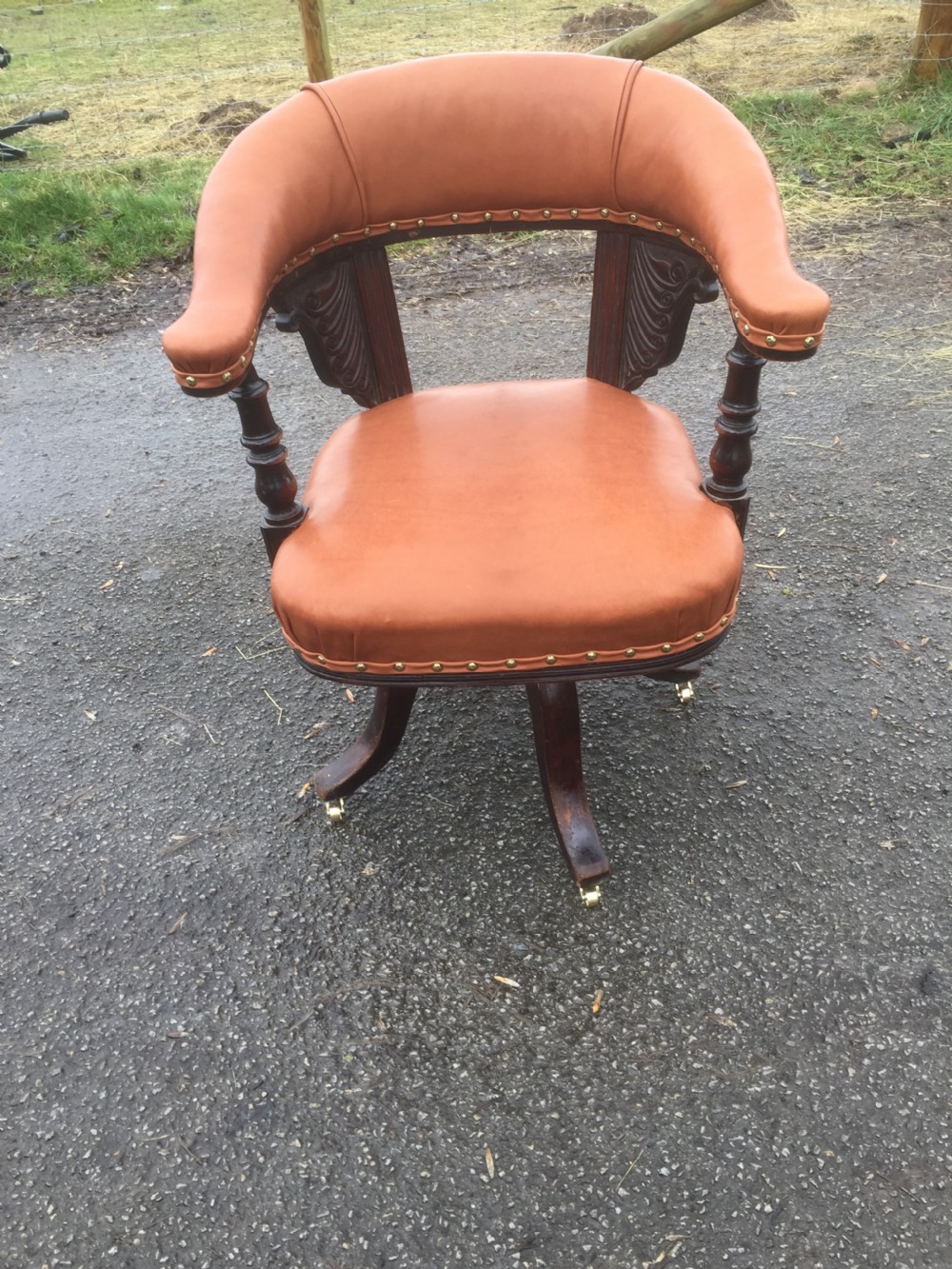 Nineteenth century swivel desk chair in tan hide 