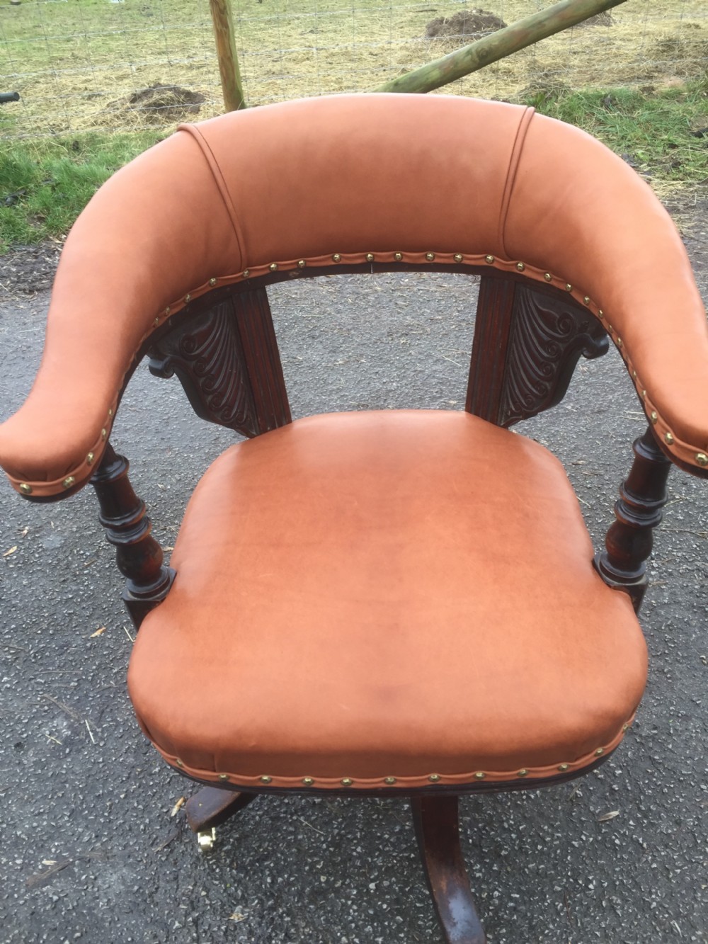 Nineteenth century swivel desk chair in tan hide  View II
