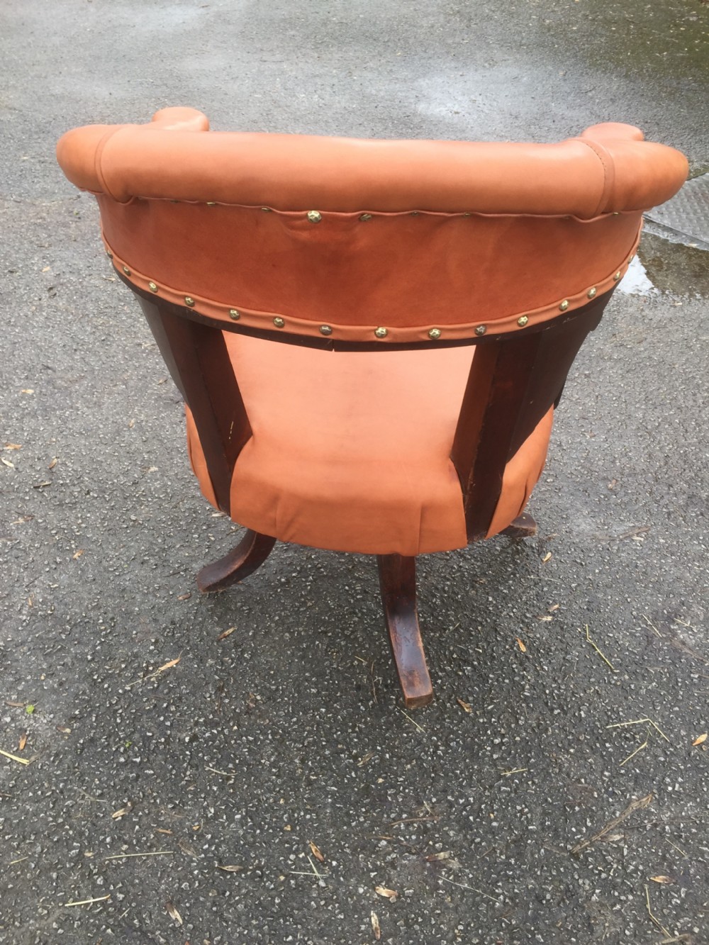 Nineteenth century swivel desk chair in tan hide  View V