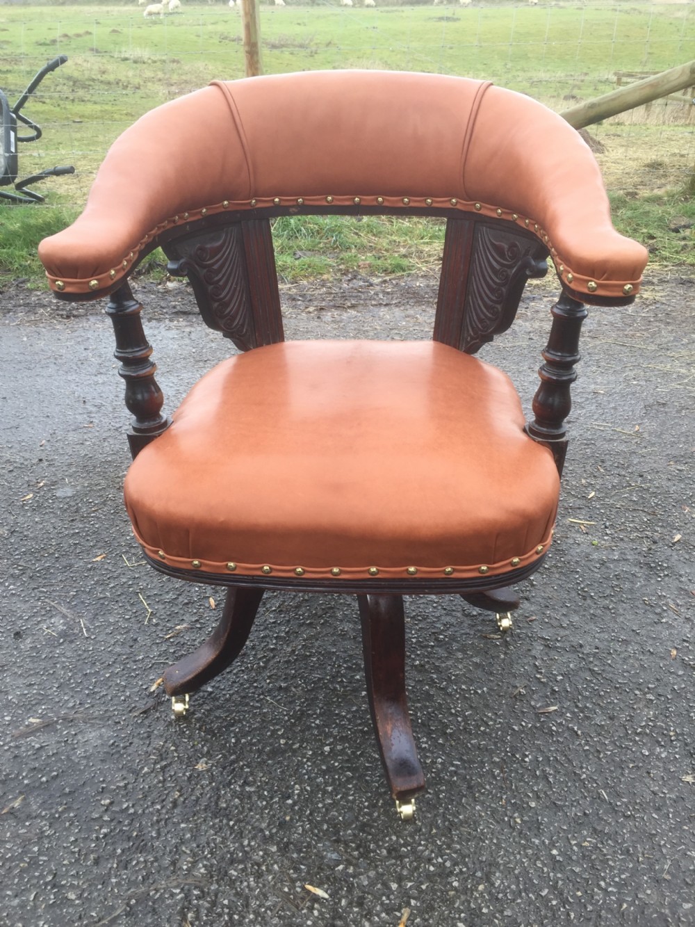 Nineteenth century swivel desk chair in tan hide  View VIII