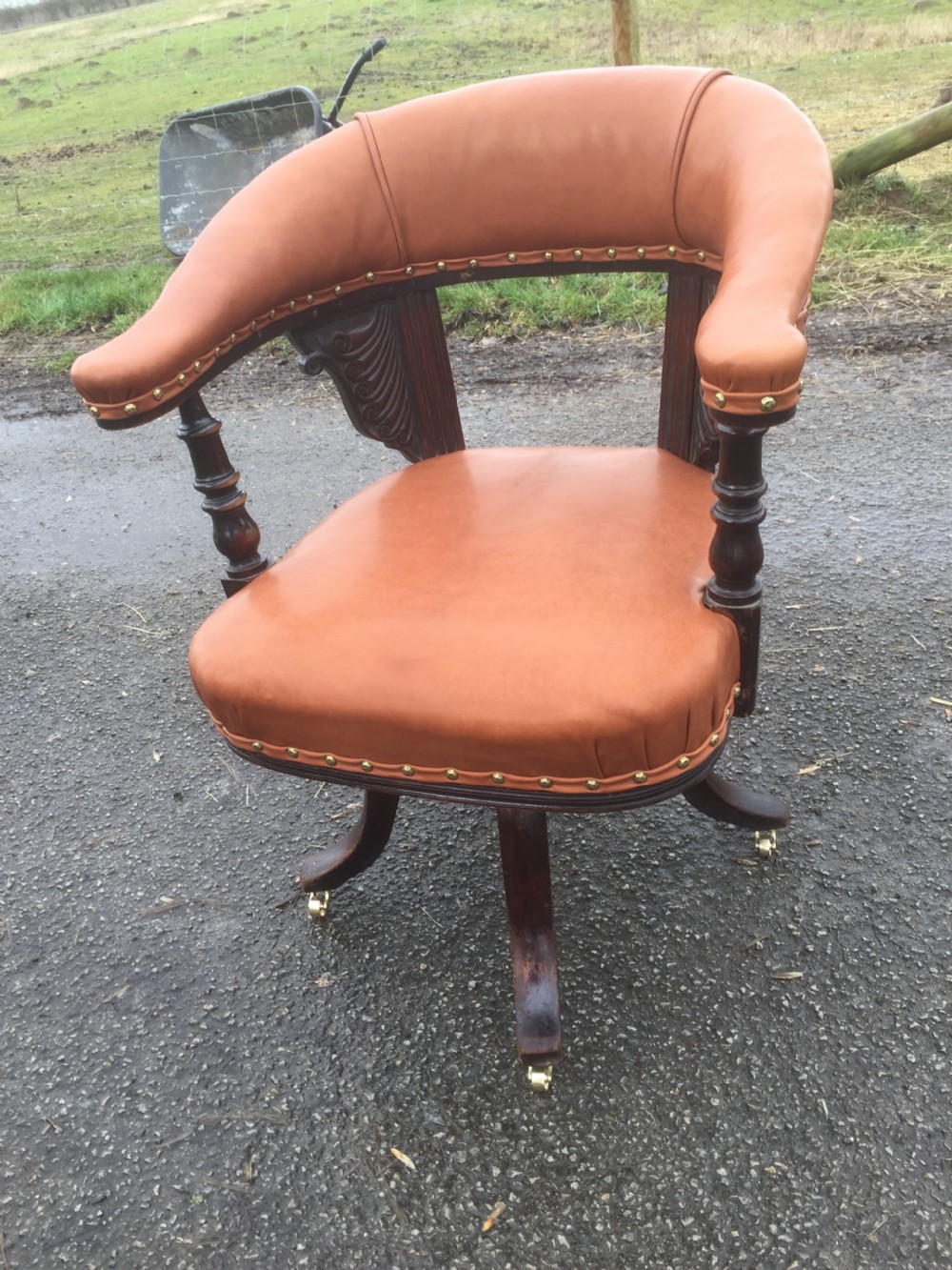 Nineteenth century swivel desk chair in tan hide  View IX