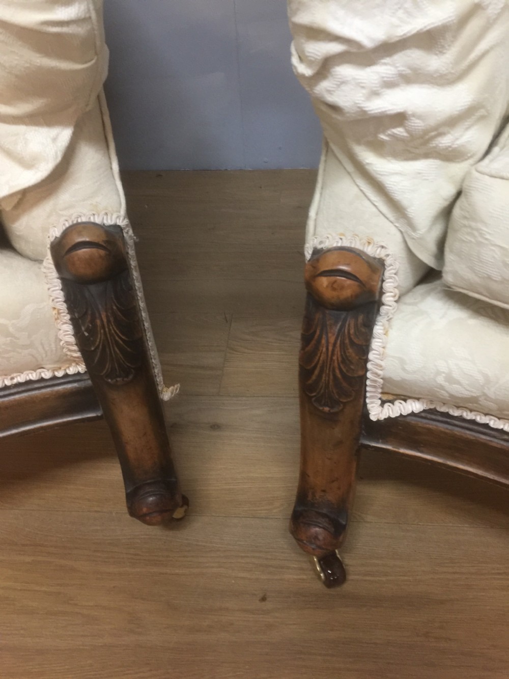 Pair of carved country house armchairs with feather cushions View V
