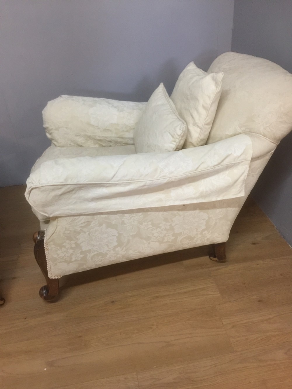 Pair of carved country house armchairs with feather cushions View VI