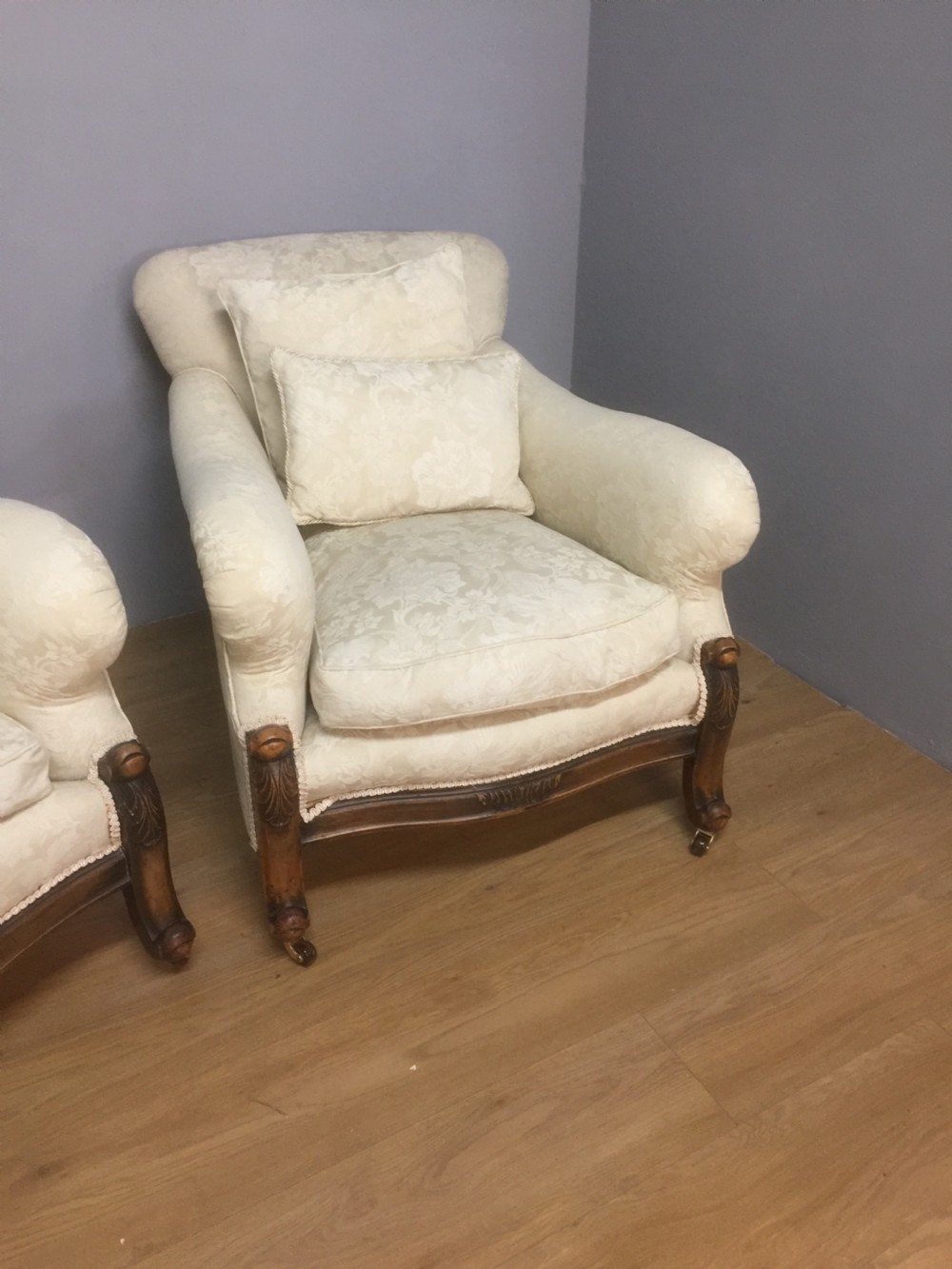 Pair of carved country house armchairs with feather cushions View VIII