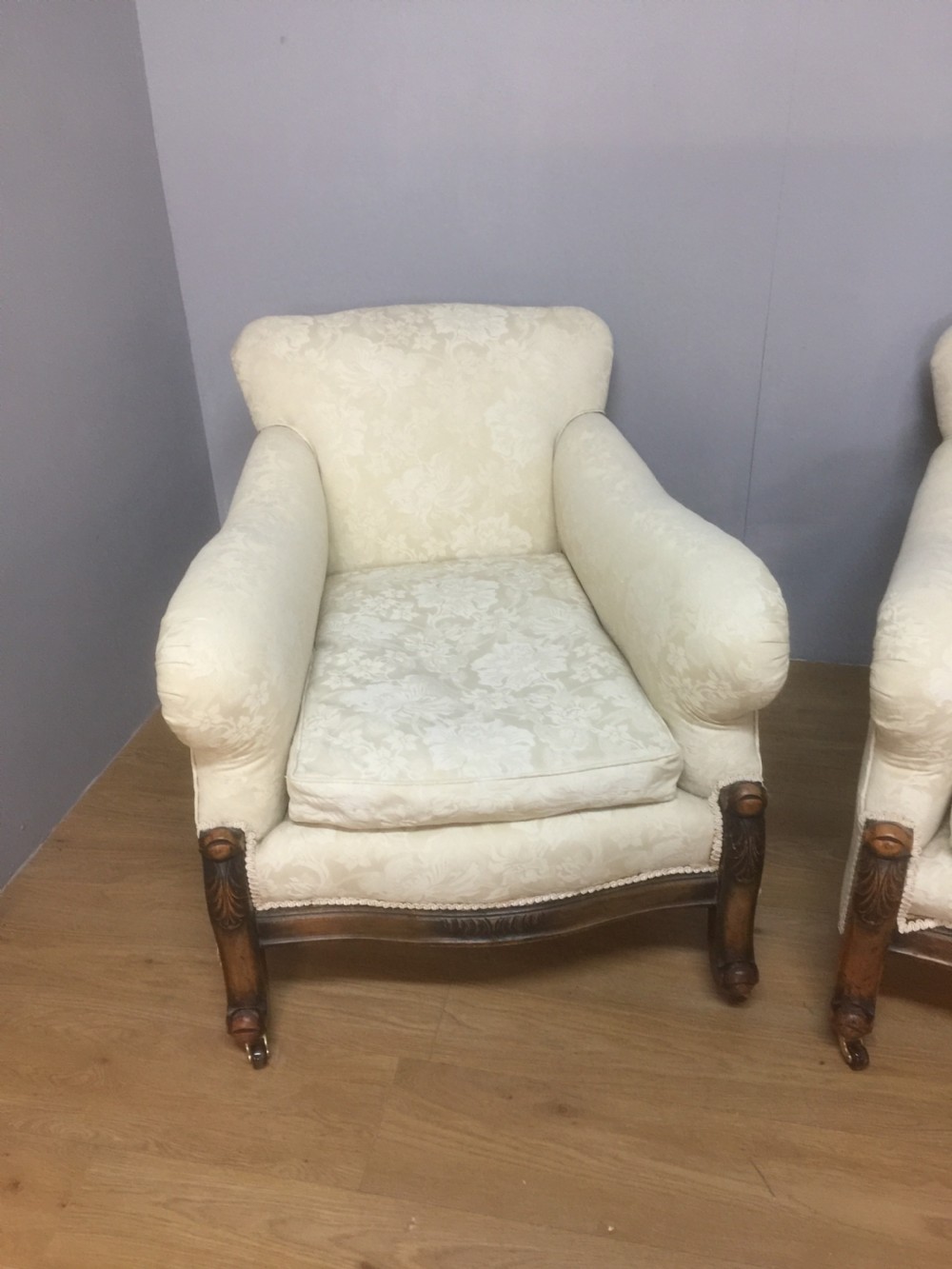 Pair of carved country house armchairs with feather cushions View X