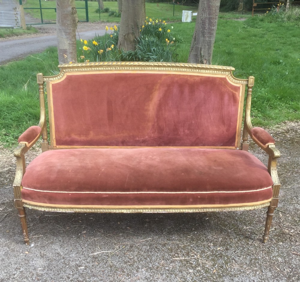 Nineteenth century gilt framed French Sofa in pink velvet 