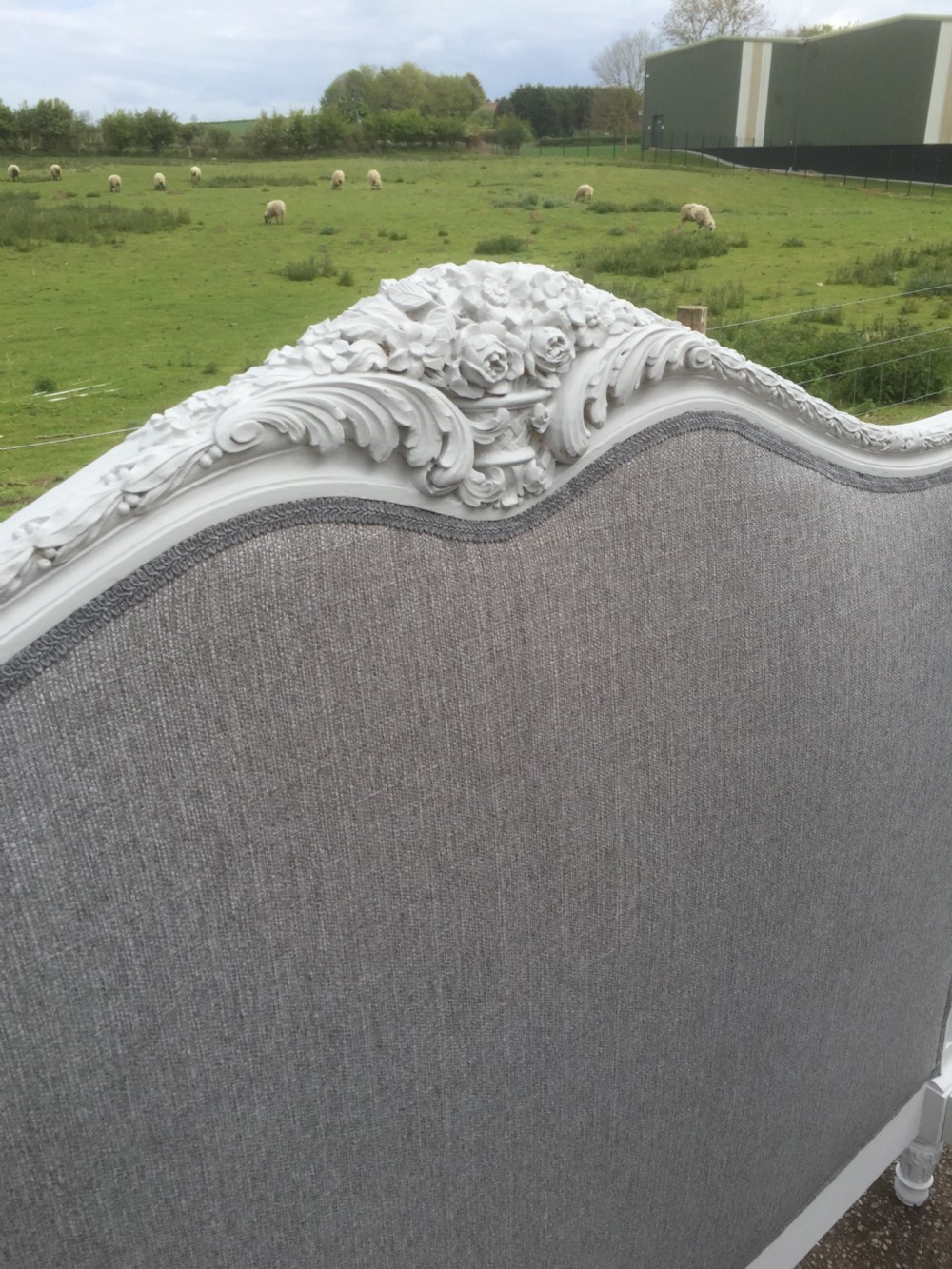 Carved wooden French bed six feet wide circa 1910 View II