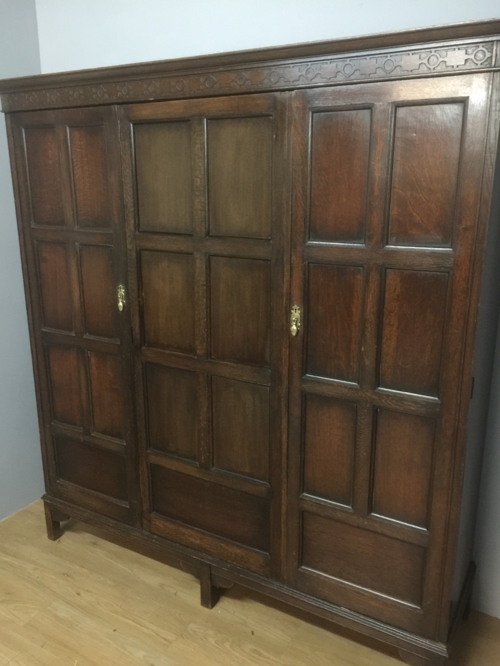Solid oak triple wardrobe by Waring and Gillows circa 1920  View II