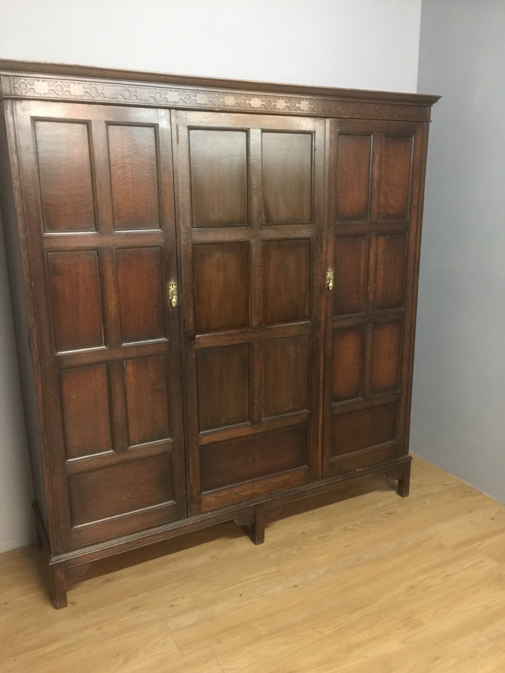 Solid oak triple wardrobe by Waring and Gillows circa 1920  View XII