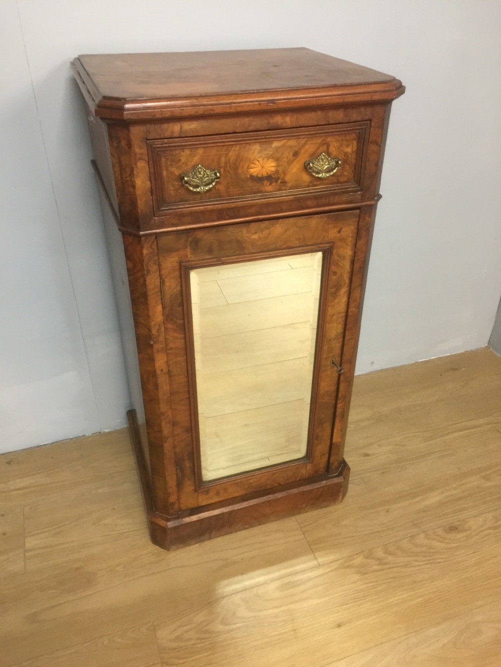Nineteenth century inlaid burr walnut cabinet with mirrored door