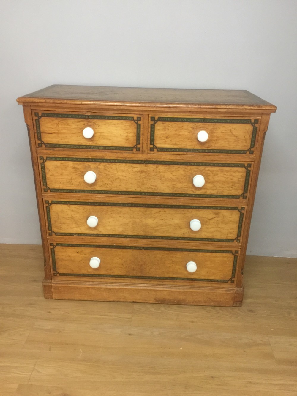 Nineteenth century pine chest of drawers with painted decoration 