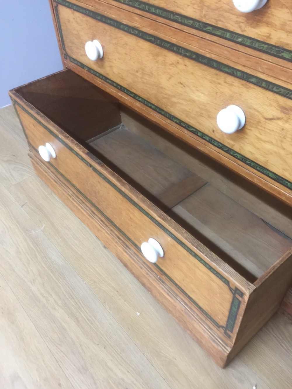 Nineteenth century pine chest of drawers with painted decoration  View XI