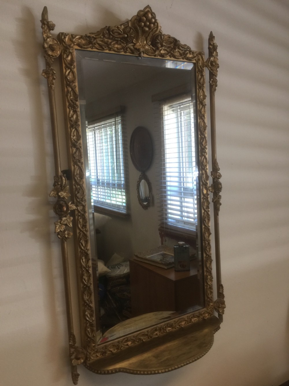 Nineteenth century bevelled mirror in an ornate gilt frame View V