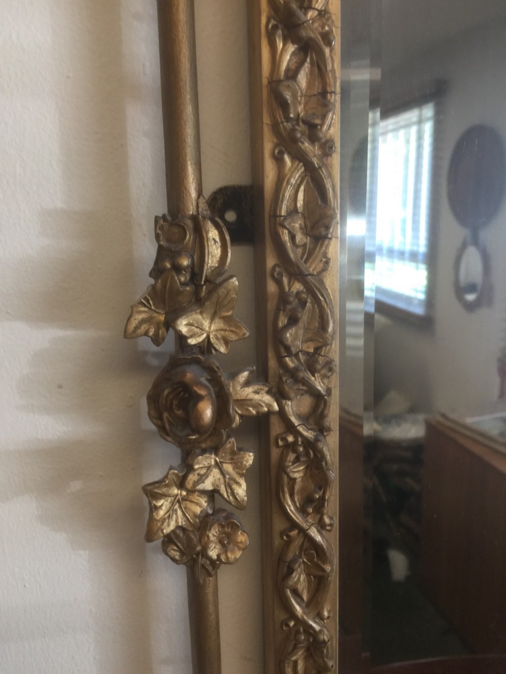 Nineteenth century bevelled mirror in an ornate gilt frame View VI