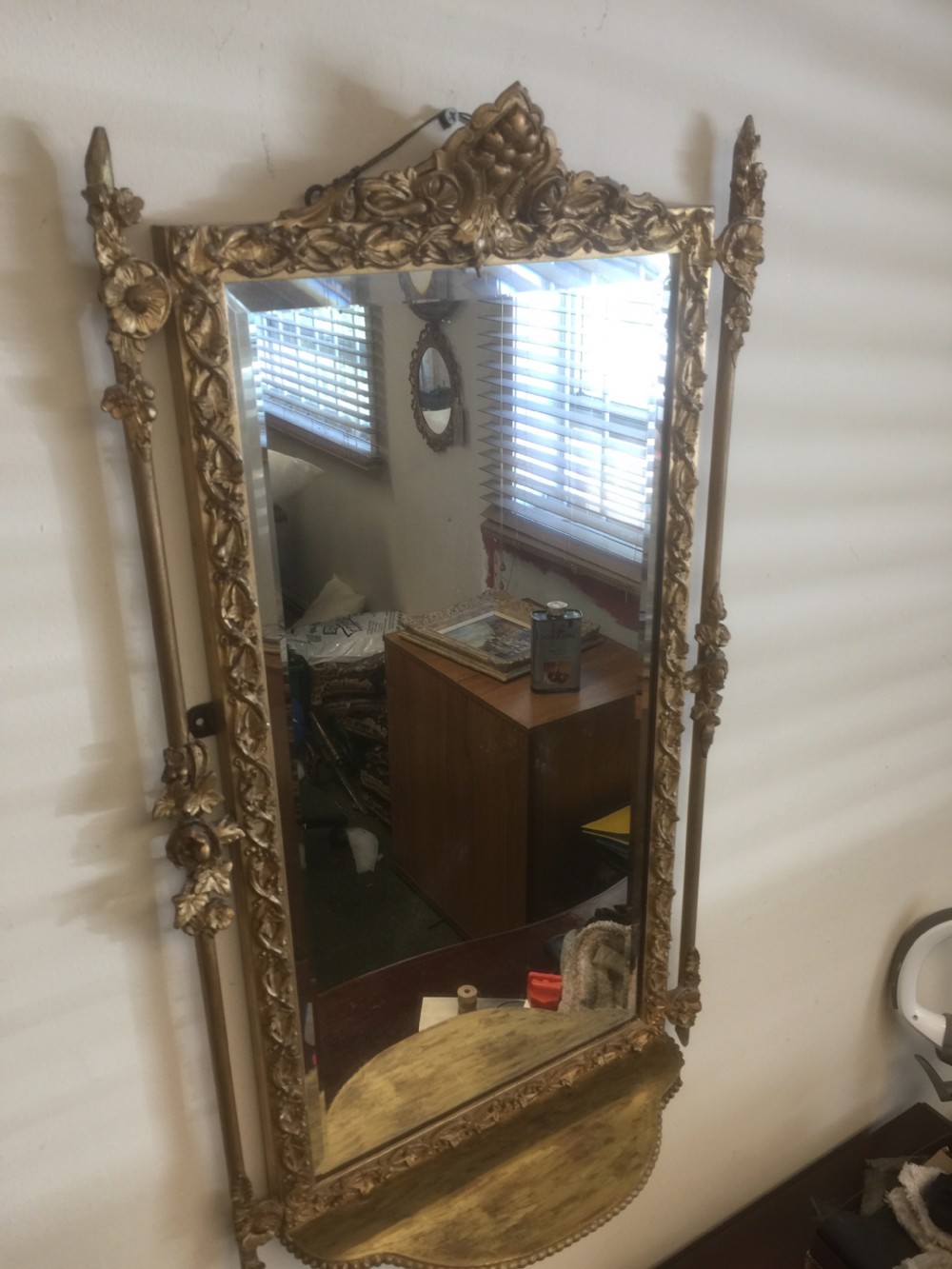Nineteenth century bevelled mirror in an ornate gilt frame View VIII