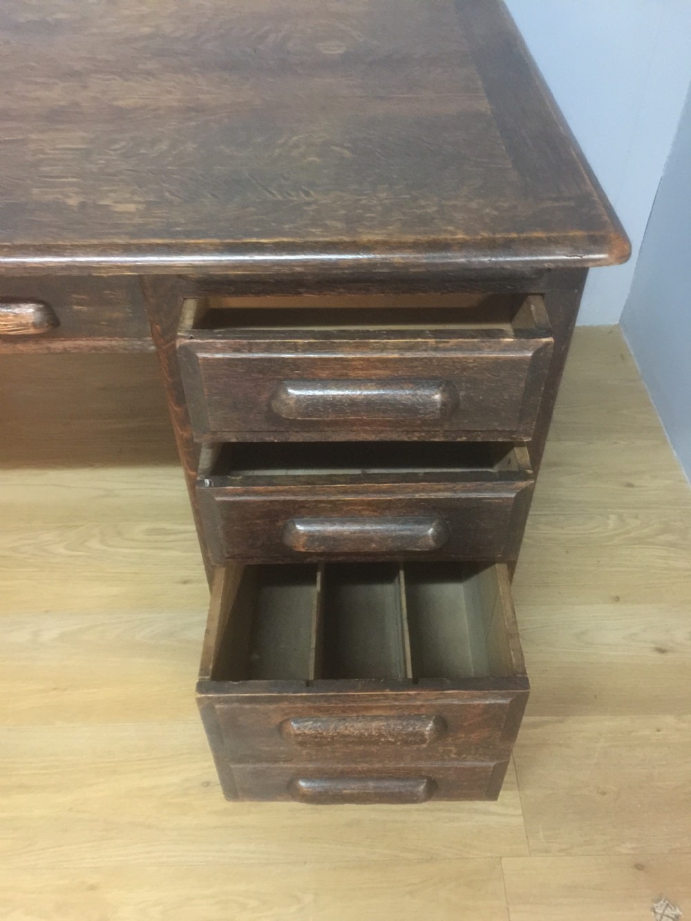 Large oak twin pedestal desk with fielded panels circa 1910 View IV