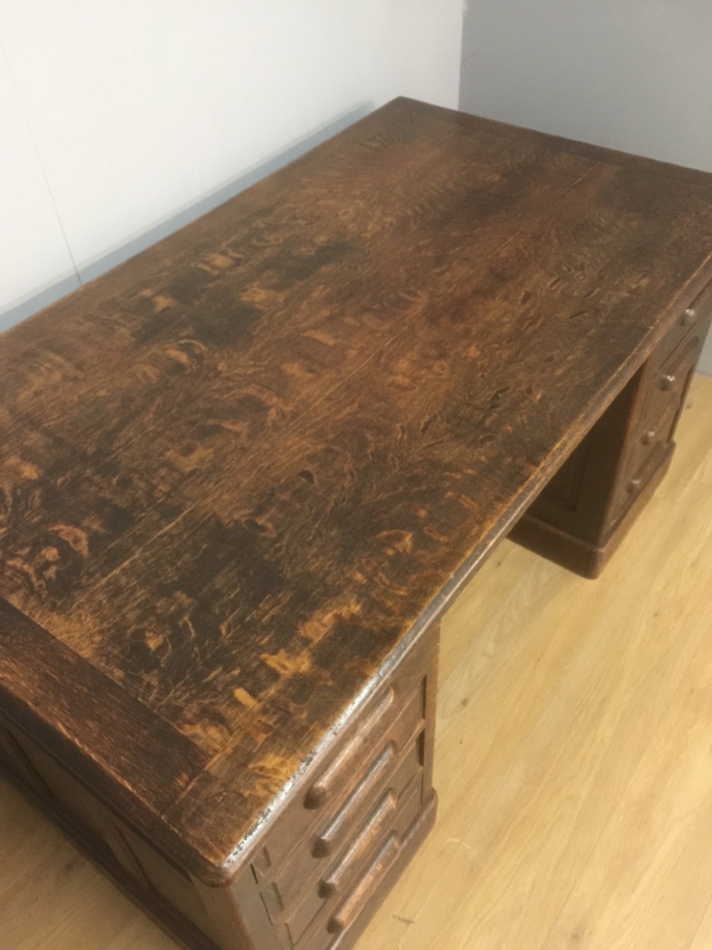 Large oak twin pedestal desk with fielded panels circa 1910 View V