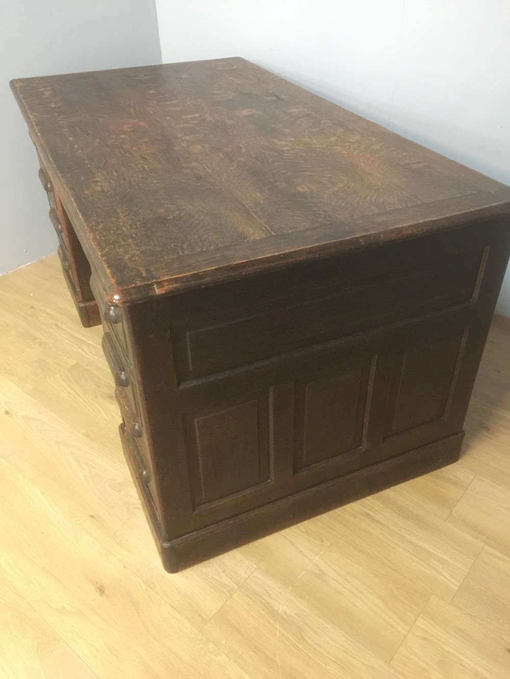 Large oak twin pedestal desk with fielded panels circa 1910 View VII