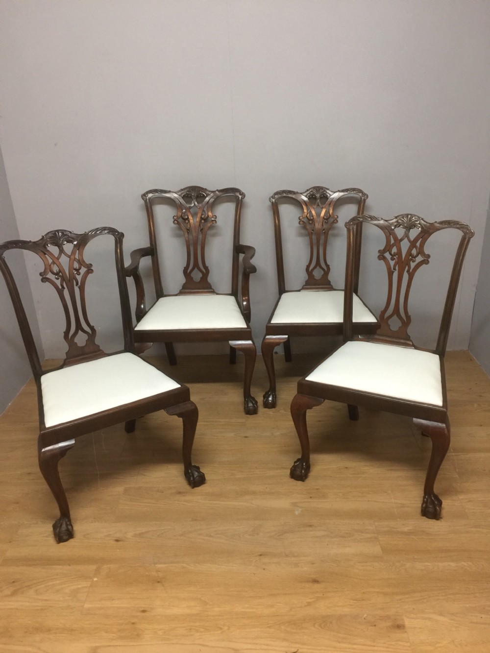 Four Edwardian solid mahogany Chippendale style dining chairs 