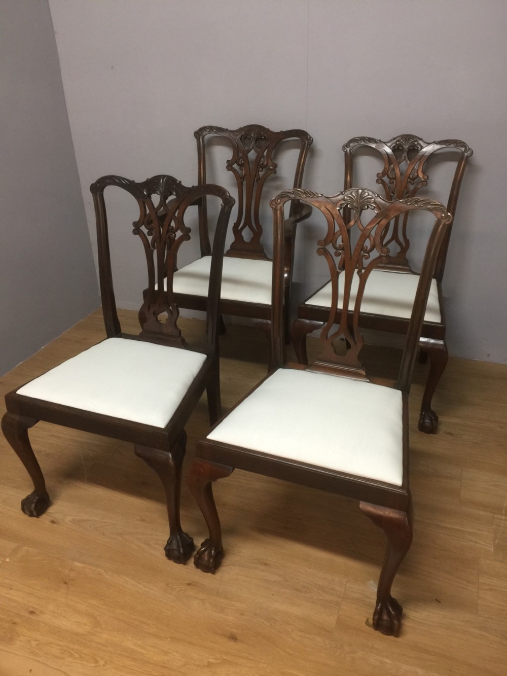 Four Edwardian solid mahogany Chippendale style dining chairs  View X