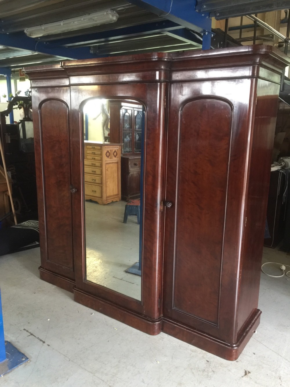 Nineteenth century flame mahogany triple wardrobe