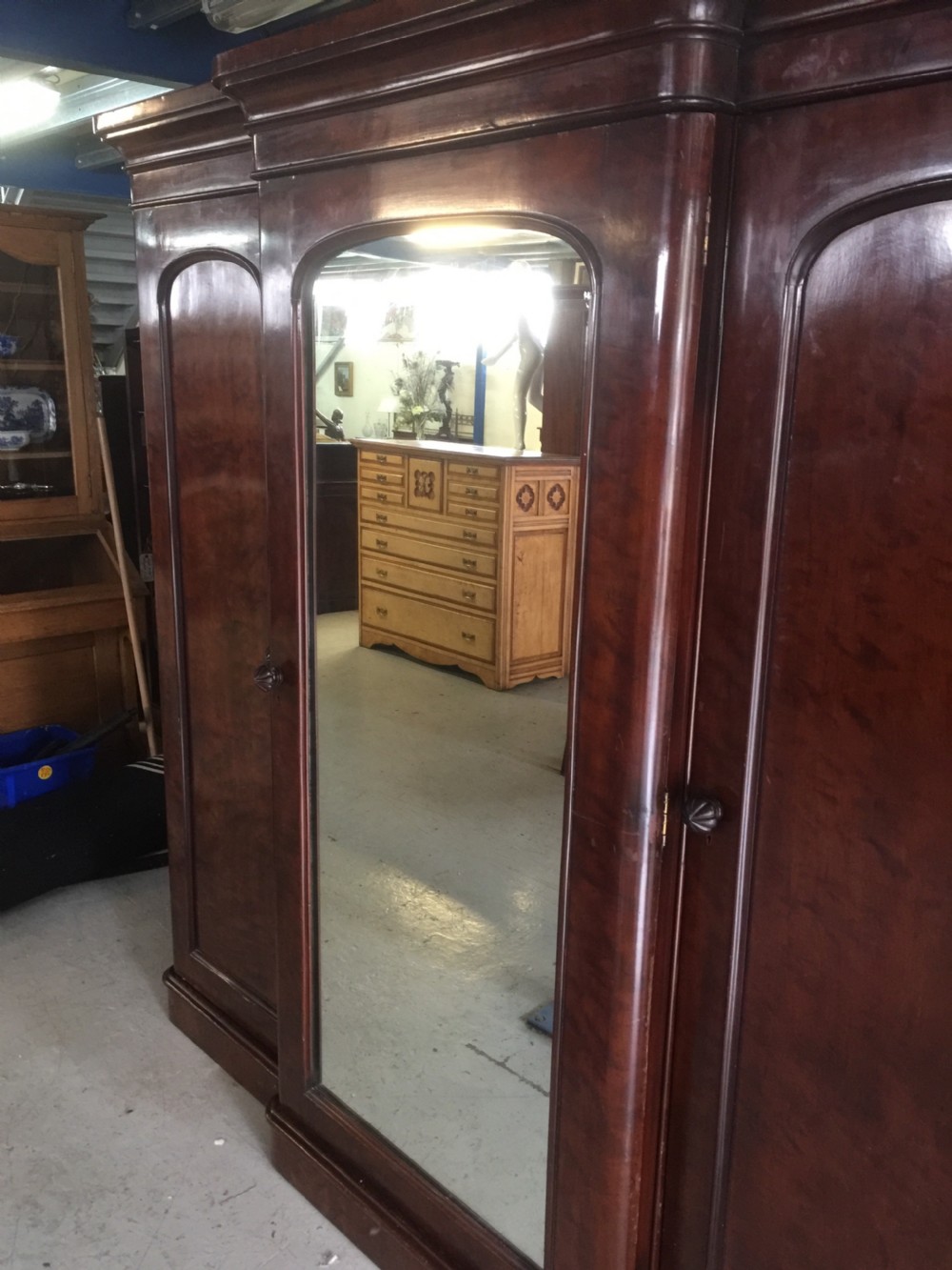 Nineteenth century flame mahogany triple wardrobe View IV