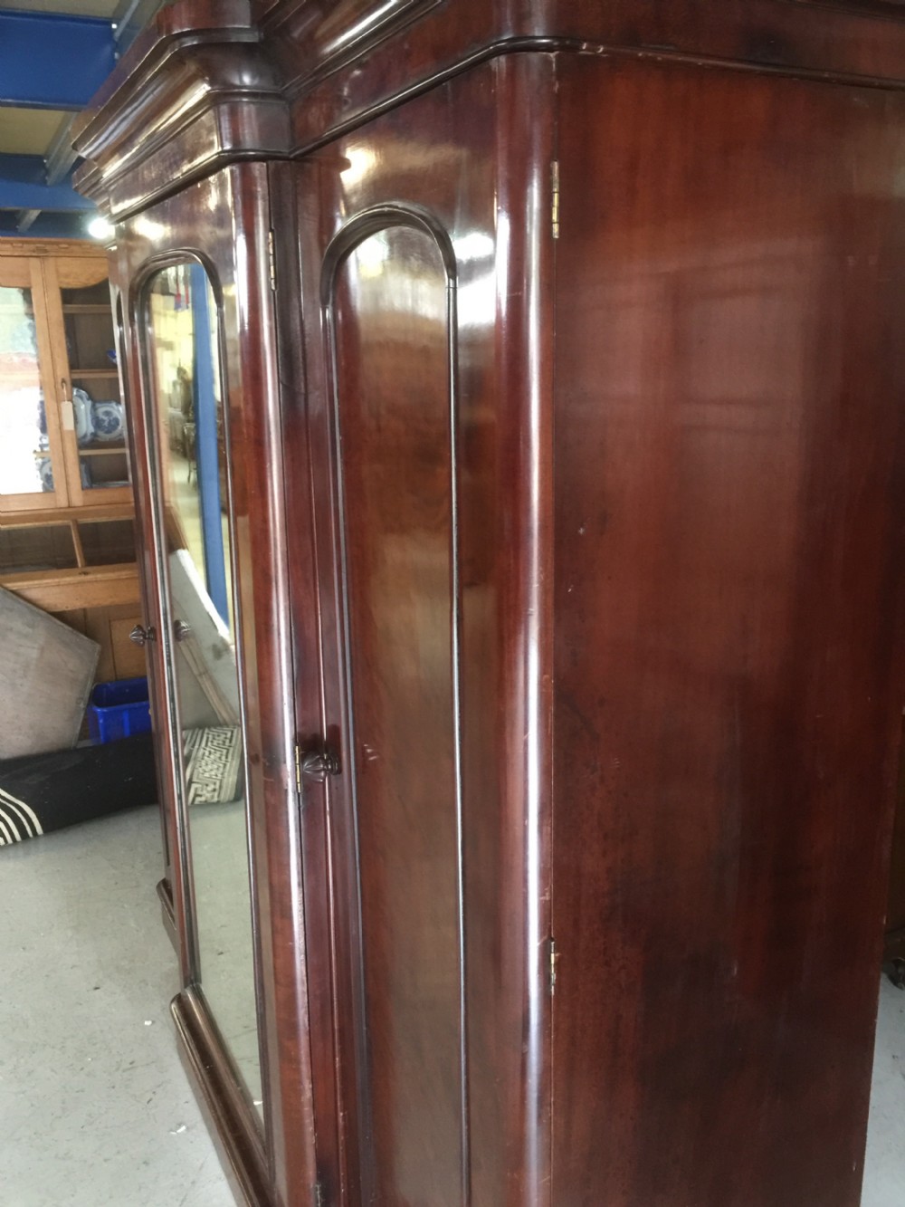 Nineteenth century flame mahogany triple wardrobe View V