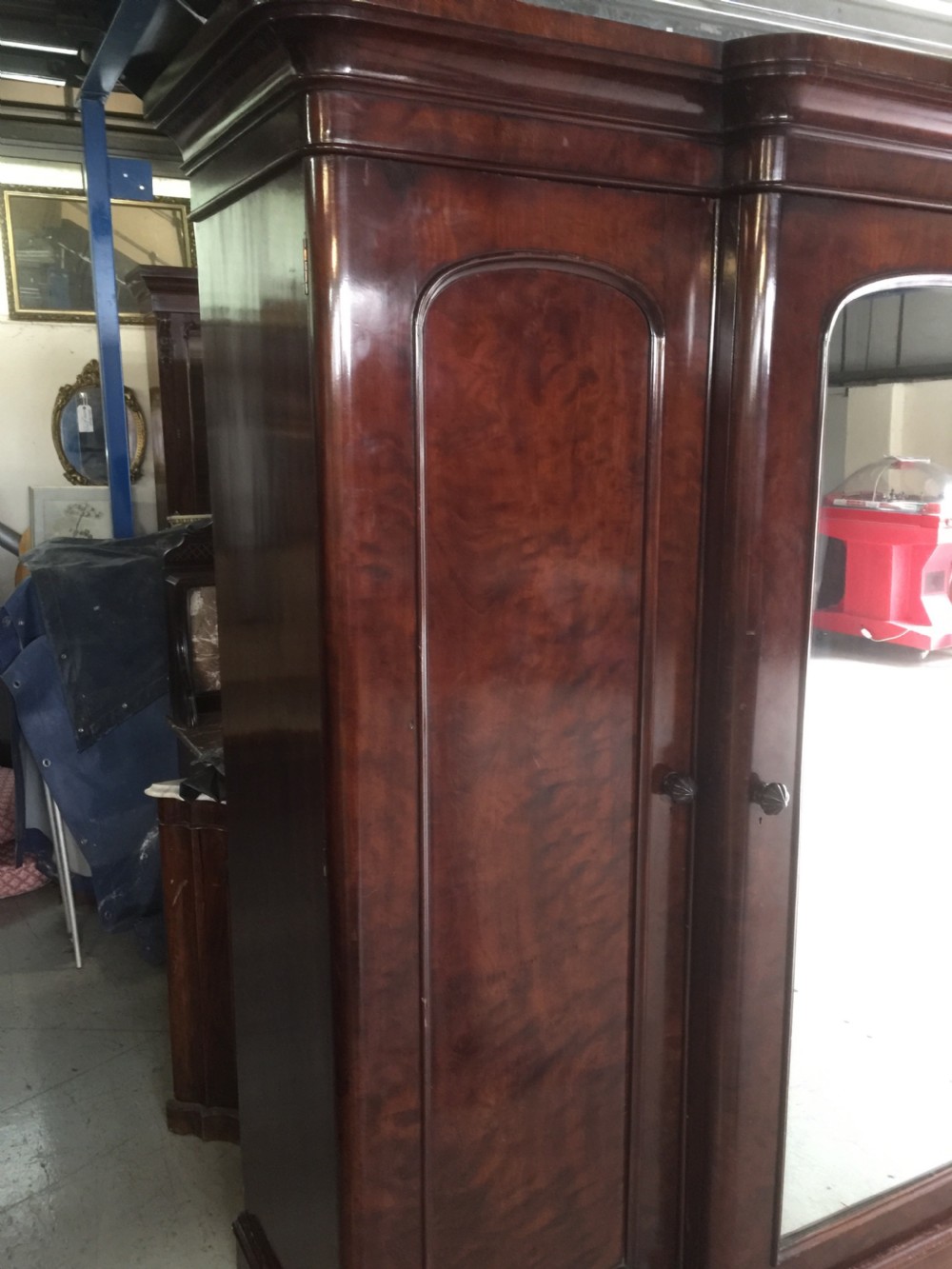 Nineteenth century flame mahogany triple wardrobe View VII