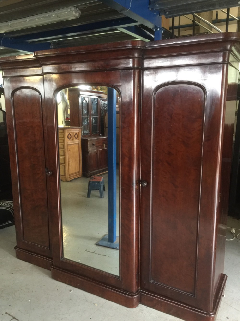 Nineteenth century flame mahogany triple wardrobe View XV