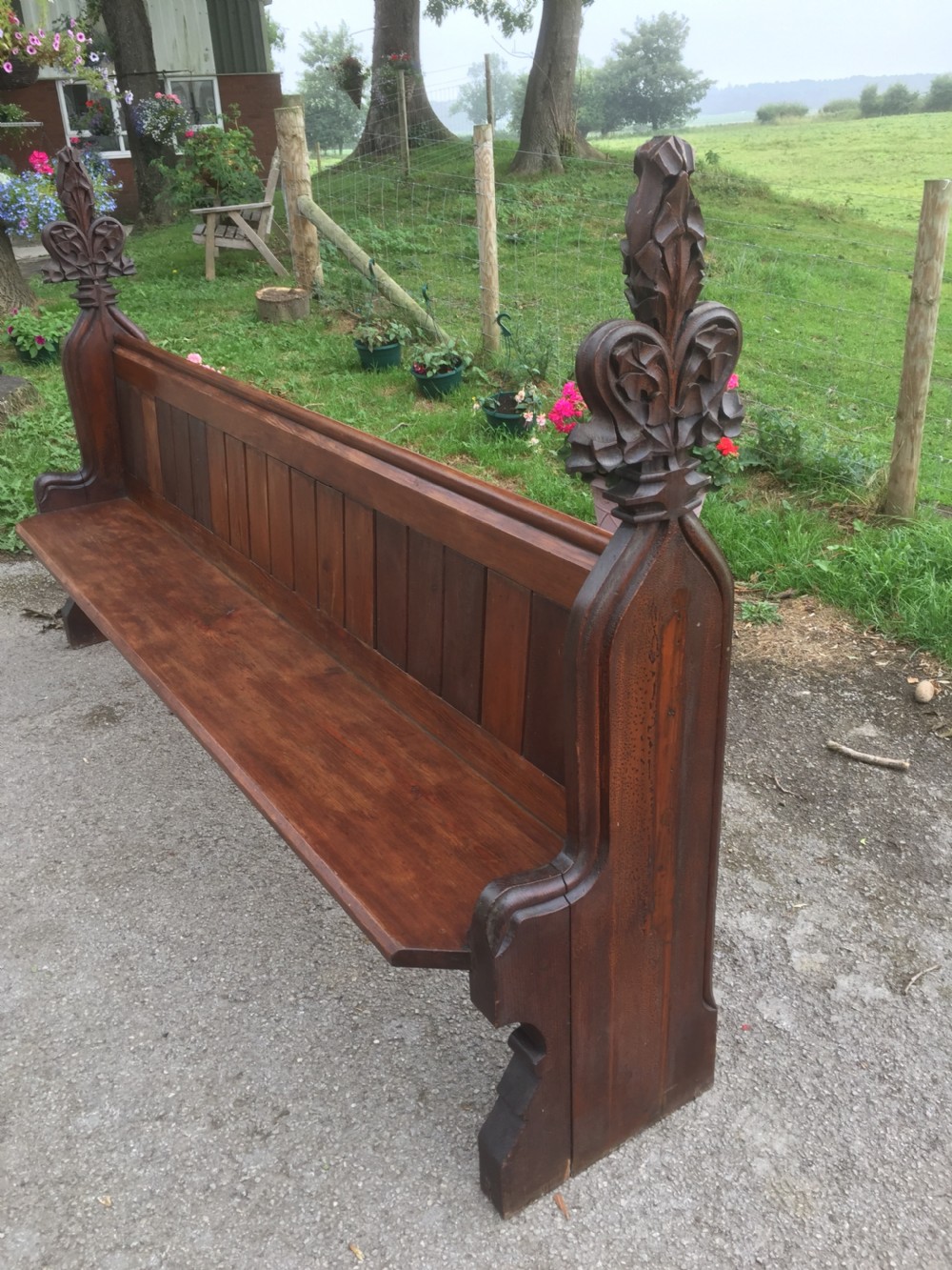 Nineteenth century pine pew with carved fleur de Lys finials   View III
