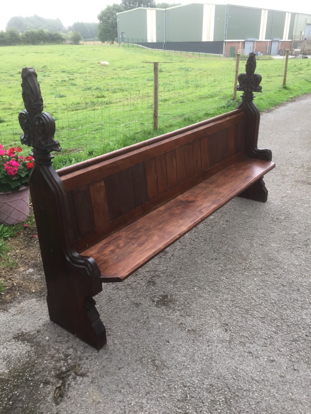 Nineteenth century pine pew with carved fleur de Lys finials   View VI