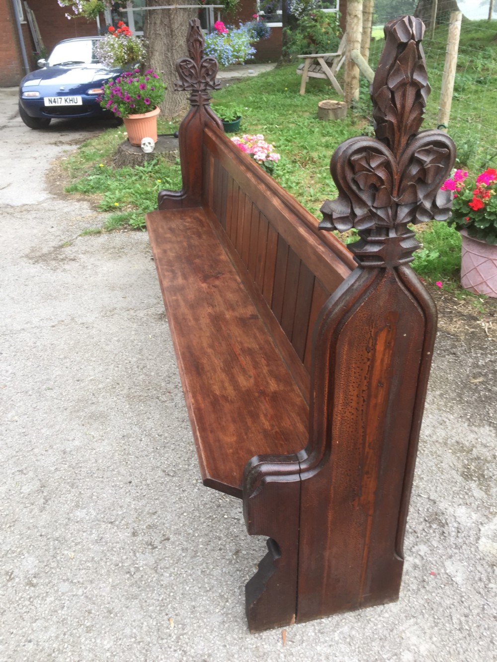 Nineteenth century pine pew with carved fleur de Lys finials   View IX