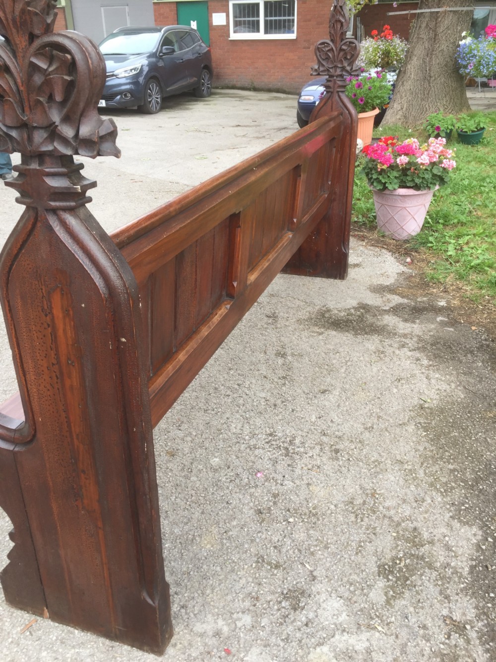 Nineteenth century pine pew with carved fleur de Lys finials   View X