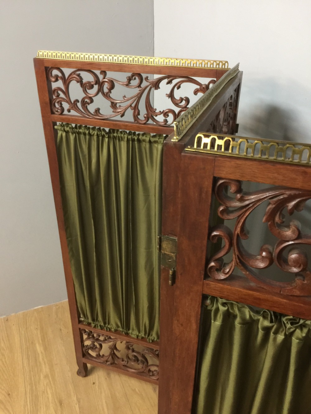 Late nineteenth century four panel screen with scrolling panels and brass gallery  View III
