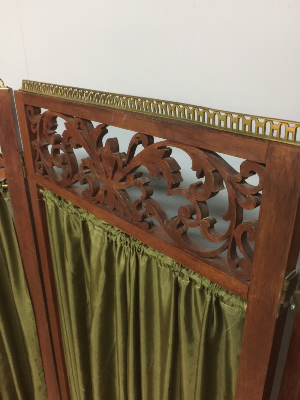Late nineteenth century four panel screen with scrolling panels and brass gallery  View IX