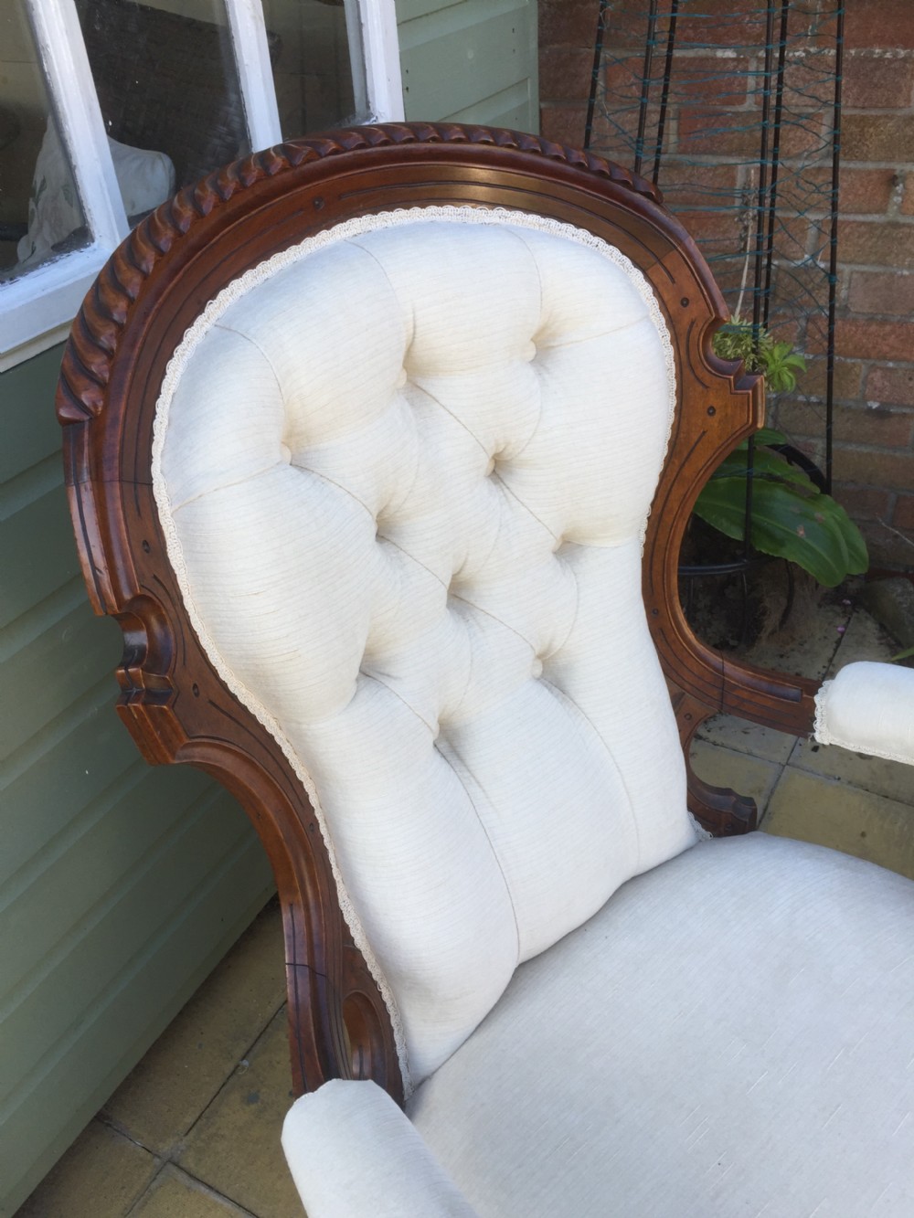 Nineteenth century walnut spoon back armchair on turned and fluted legs  View III