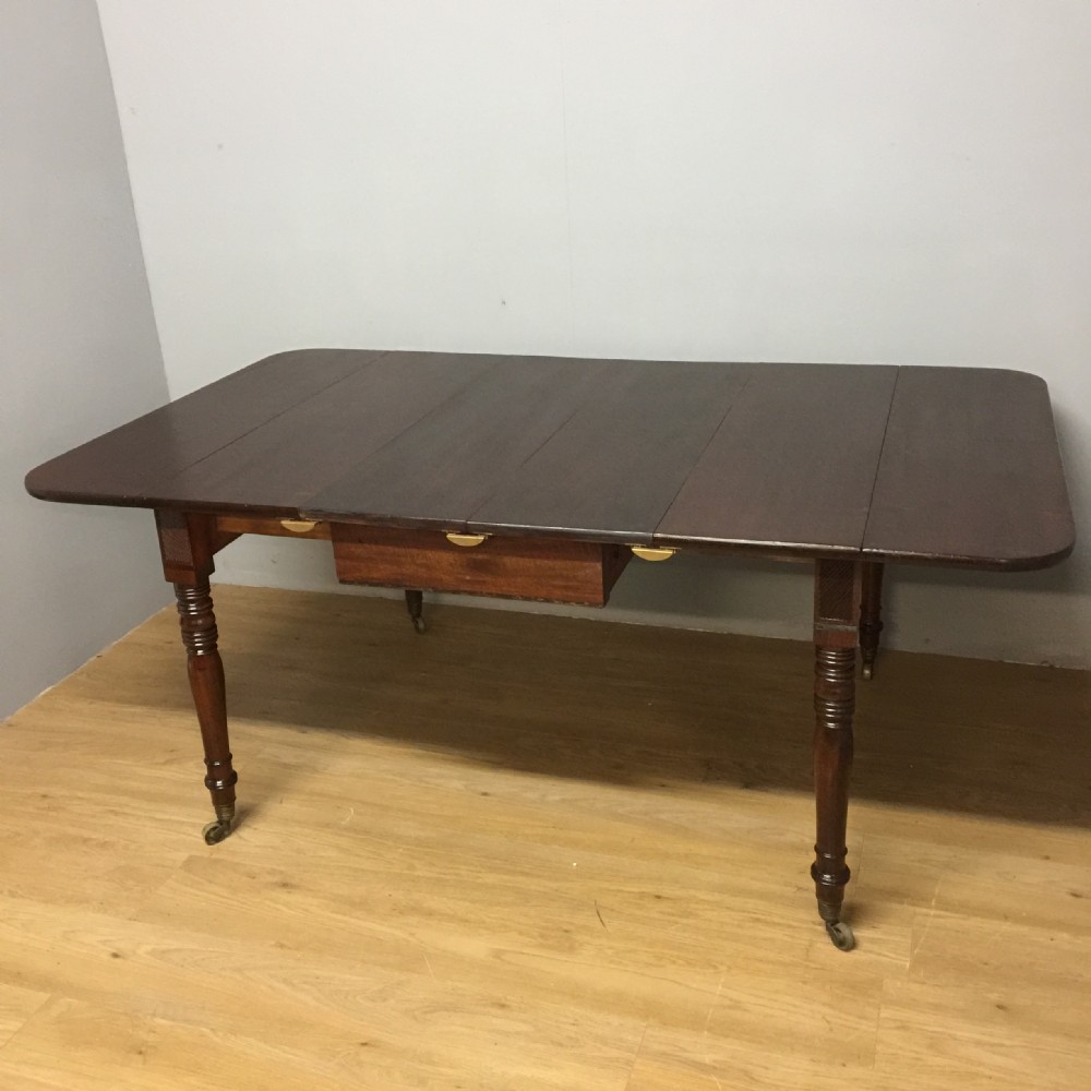 Regency mahogany extending six seater dining table circa 1830