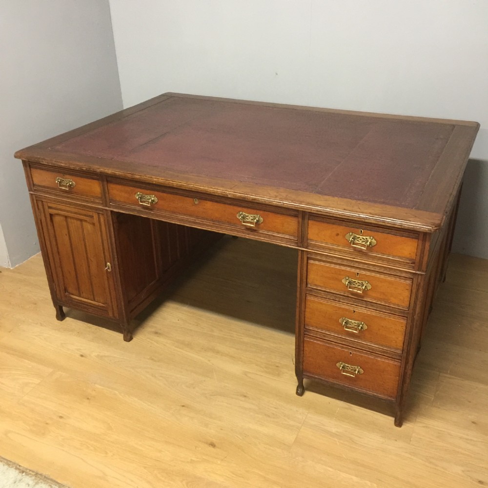 Nineteenth century walnut partners desk with inset leather top