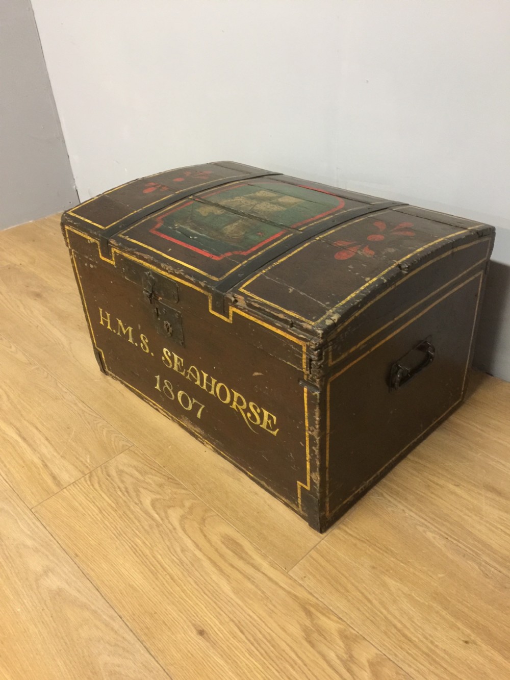 Nineteenth century dome topped pine trunk with painted decoration 