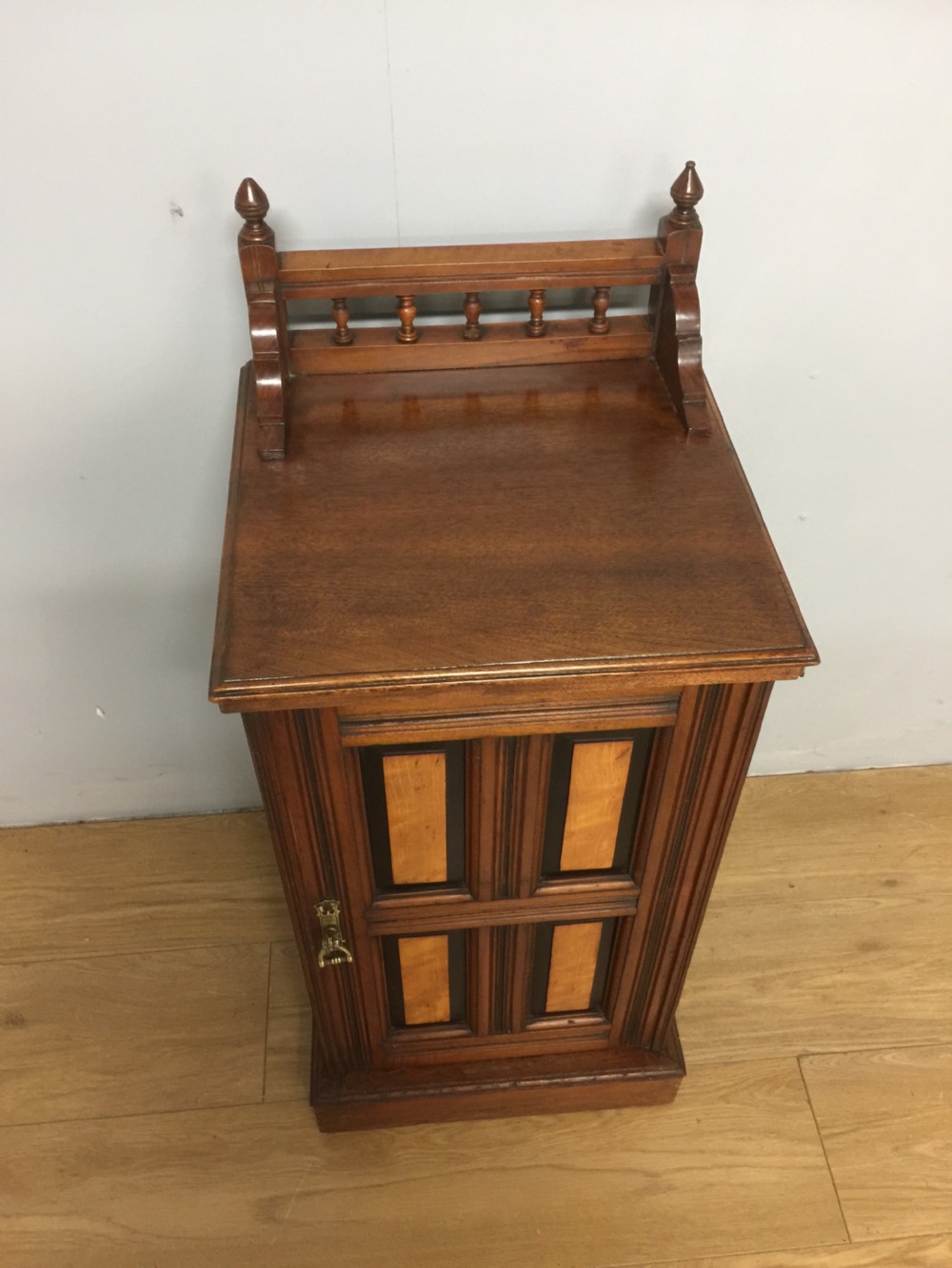 Walnut bedside cabinet with ebony and satin birch panels circa 1890 View II