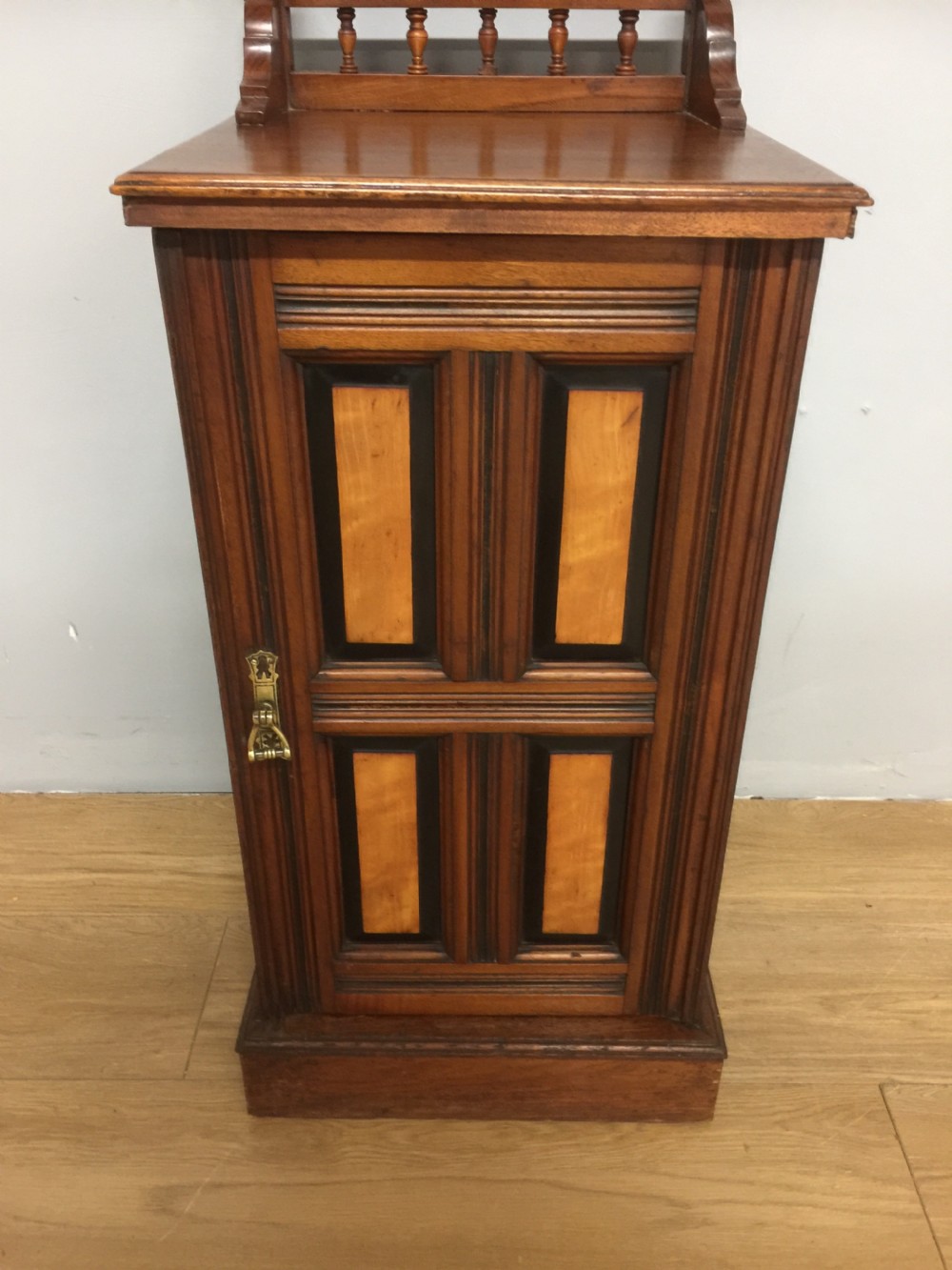 Walnut bedside cabinet with ebony and satin birch panels circa 1890 View III