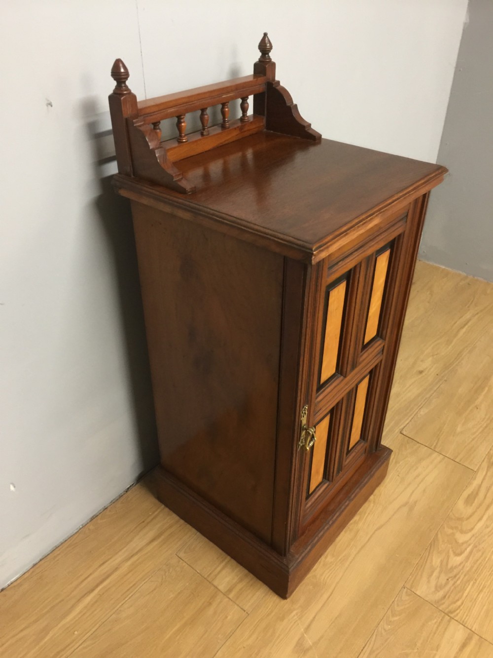 Walnut bedside cabinet with ebony and satin birch panels circa 1890 View IV