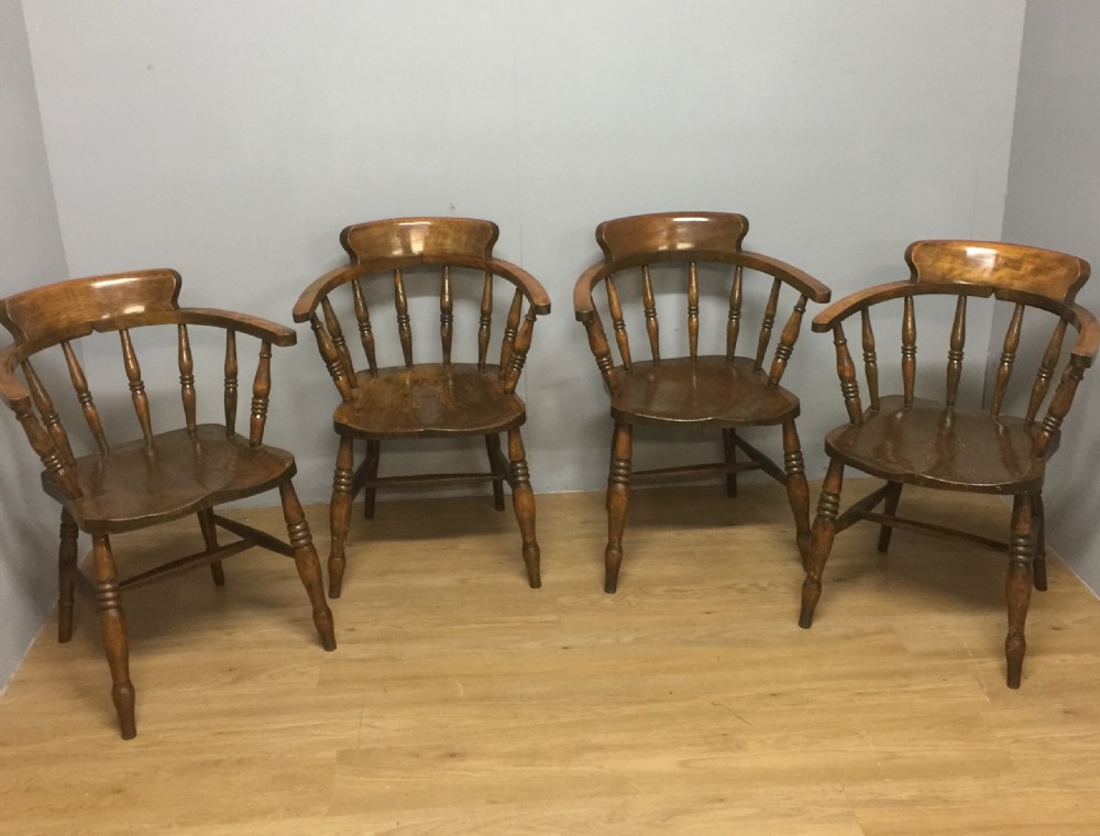 Nineteenth century set of four elm seated smokers bow chairs 