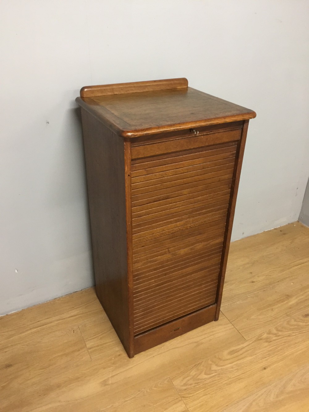 Oak tambour fronted filing cabinet in original condition 