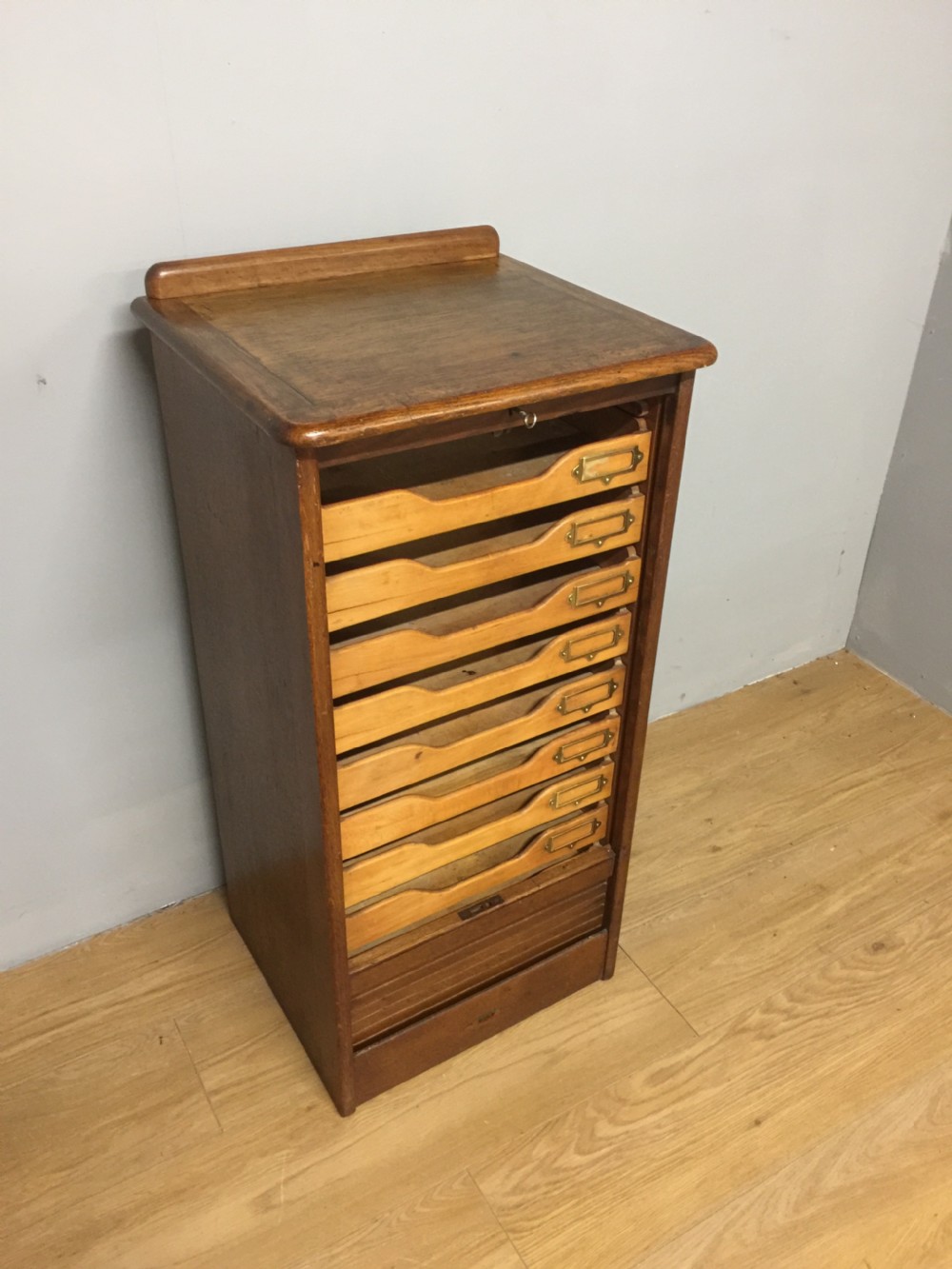 Oak tambour fronted filing cabinet in original condition  View II