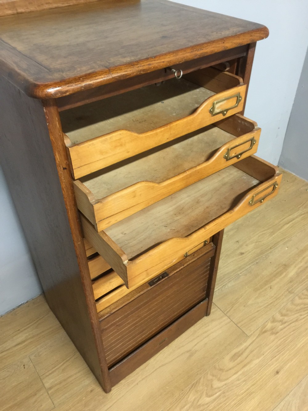 Oak tambour fronted filing cabinet in original condition  View III