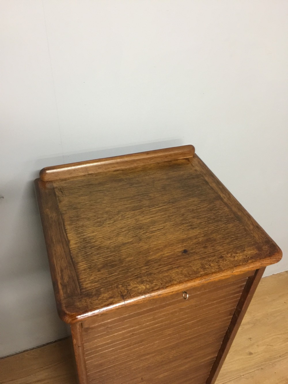 Oak tambour fronted filing cabinet in original condition  View IV