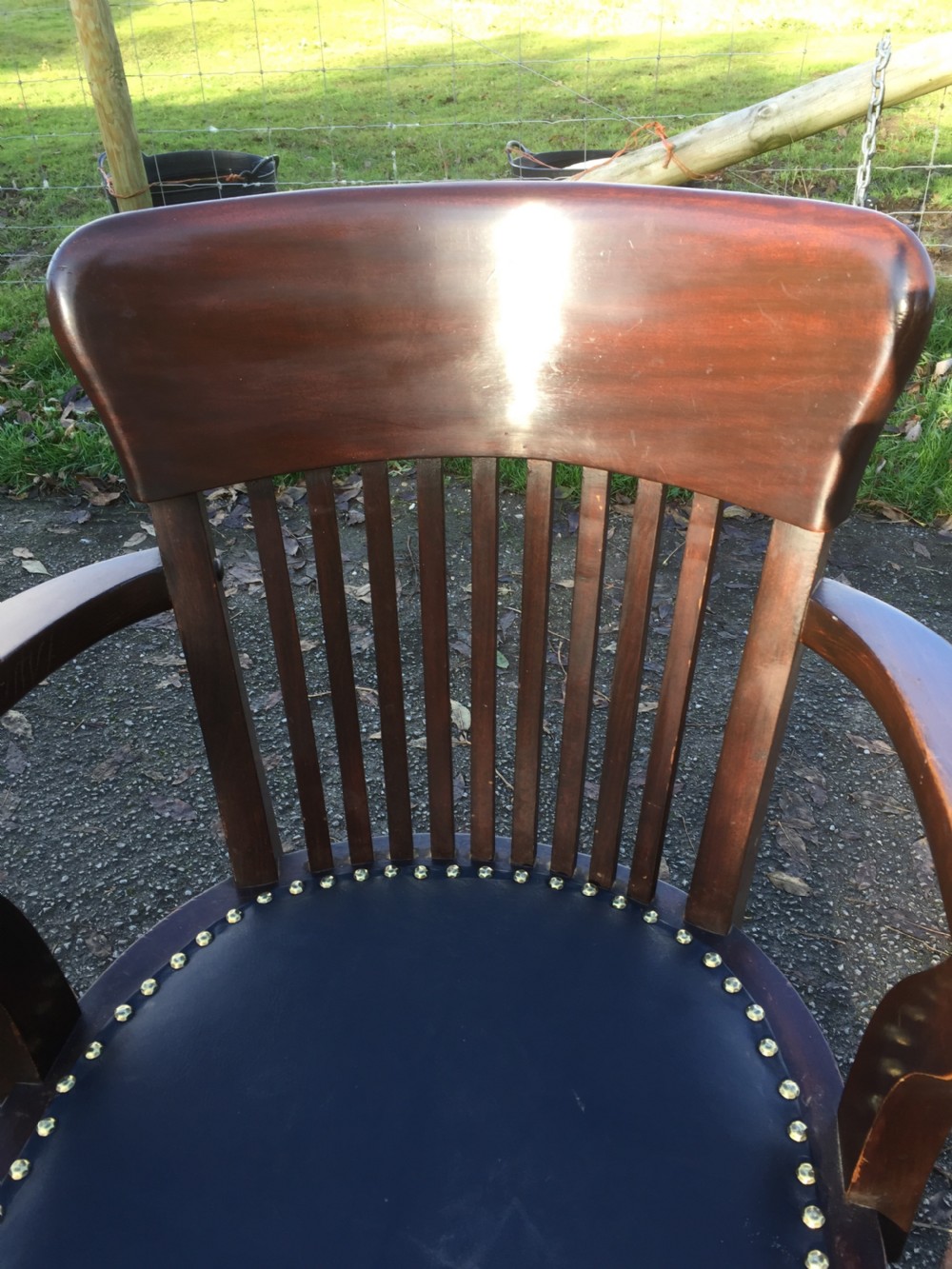 Slat back swivel office chair with leather seat  circa 1920 View IV