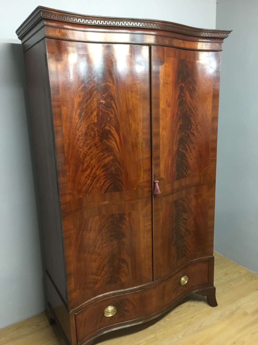 Edwardian Sheraton style serpentine fronted flame mahogany wardrobe  View II