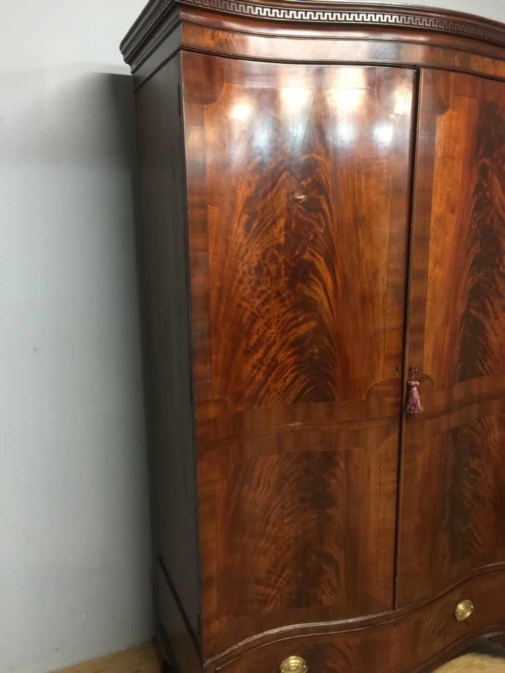 Edwardian Sheraton style serpentine fronted flame mahogany wardrobe  View III